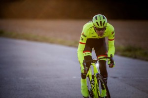 Jasper Stuyven in  Trek High Visibility apparel photoshoot  by Kristof Ramon